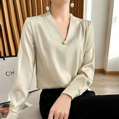 Shirt fashion temperament V-neck long-sleeved loose pearl buttons 146